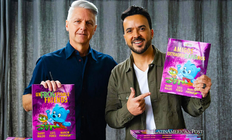 Fotografía cedida por Rondene PR donde aparece los coautores del libro infantil 'Amigos ExtraordiRANArios' ('UnFROGettable Friends'), el cantante puertorriqueño Luis Fonsi (d), y el exejecutivo de Disney y Mattel, Barry Waldo (i)