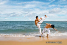 Two men practicing capoeira