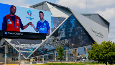 An electronic advertisement featuring Lionel Messi of Argentina is seen outside of Mercedes-Benz Stadium
