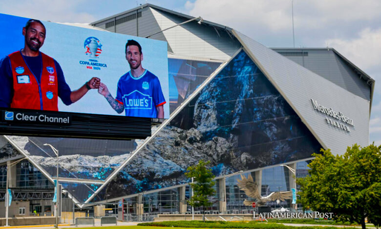 An electronic advertisement featuring Lionel Messi of Argentina is seen outside of Mercedes-Benz Stadium