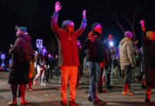 Latin American Migrants Gain Protection as Neighbors Watch ICE Before Dawn