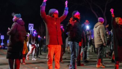 Latin American Migrants Gain Protection as Neighbors Watch ICE Before Dawn